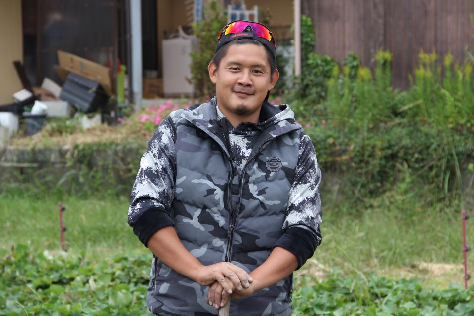 畑を提供する、農家の白石雄大さん